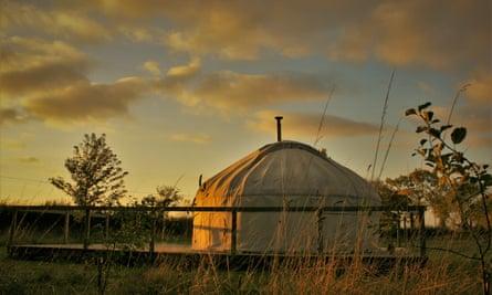 Ivy Grange Farm view of yurt and evening sky